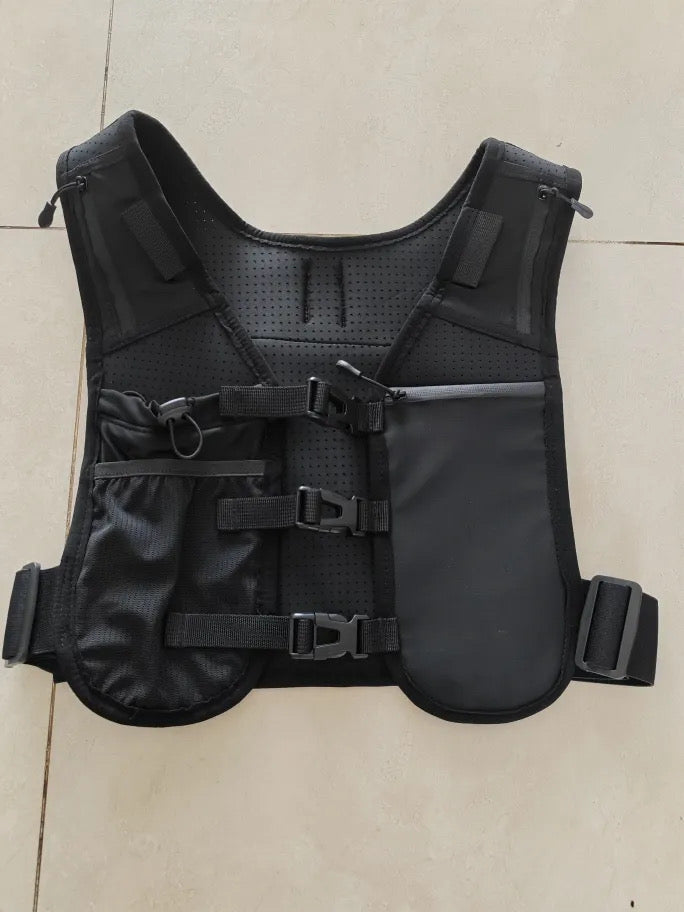 Gilet de trails "Elan Volcanique" avec gourde, sifflet et LED